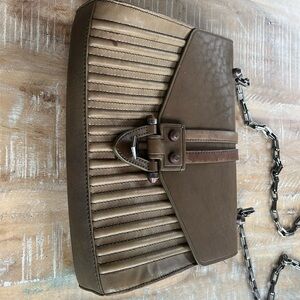 Women’s Pour La Victorie designer handbag.